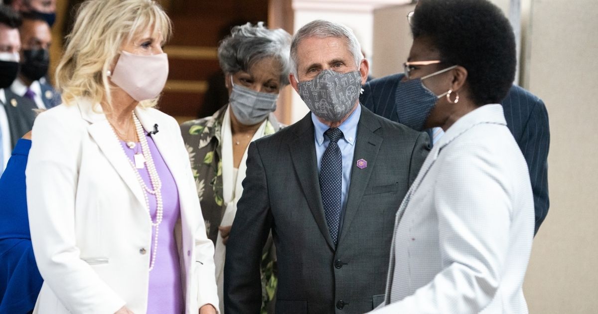 First lady Jill Biden and Dr. Anthony Fauci, director of the National Institute of Allergy and Infectious Diseases, speak with members of Abyssinian Baptist Church on Sunday in New York City.