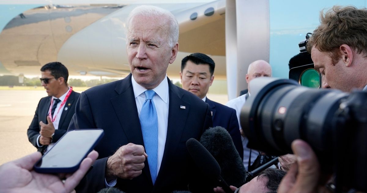 President Joe Biden speaks to reporters before boarding Air Force One at Geneva Airport in Geneva, Switzerland, on Wednesday.