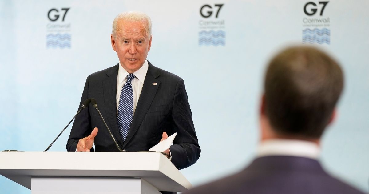 President Joe Biden speaks during a news conference after attending the G-7 summit on Sunday at Cornwall Airport in Newquay, England.