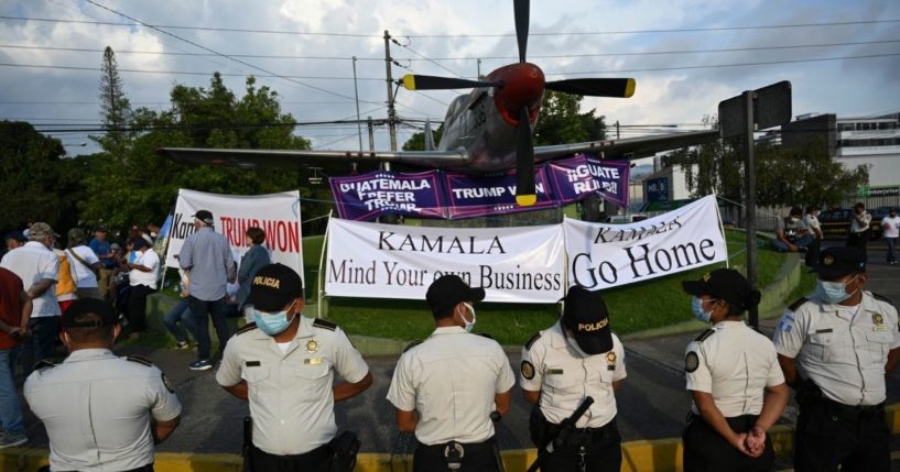 People take part in a demonstration against the visit of Vice President Kamala Harris outside the Air Force Base in Guatemala City on Sunday.