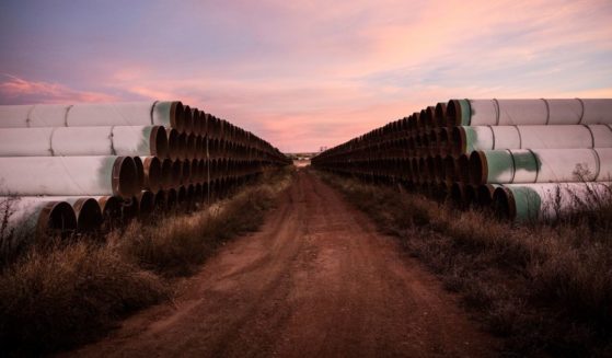 Miles of unused pipe, prepared for the Keystone XL Pipeline project, sit in a lot outside Gascoyne, North Dakota, on Oct. 14, 2014.
