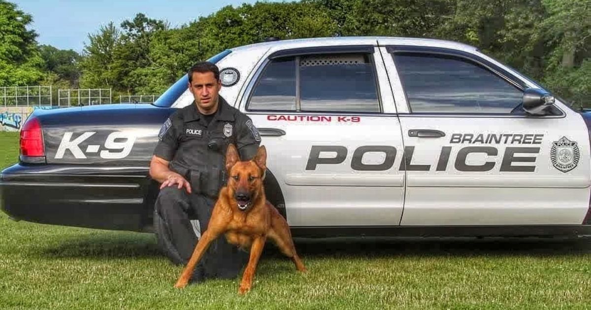 William Cushing, Jr. is pictured with Kitt, a Belgian Malinois who was killed in the line of duty earlier this month and has been credited with saving the lives of the three officers he was with.