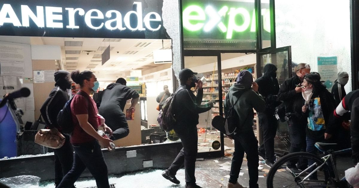 People loot a store during demonstrations over the death of George Floyd by a Minneapolis police officer on June 1, 2020, in New York.