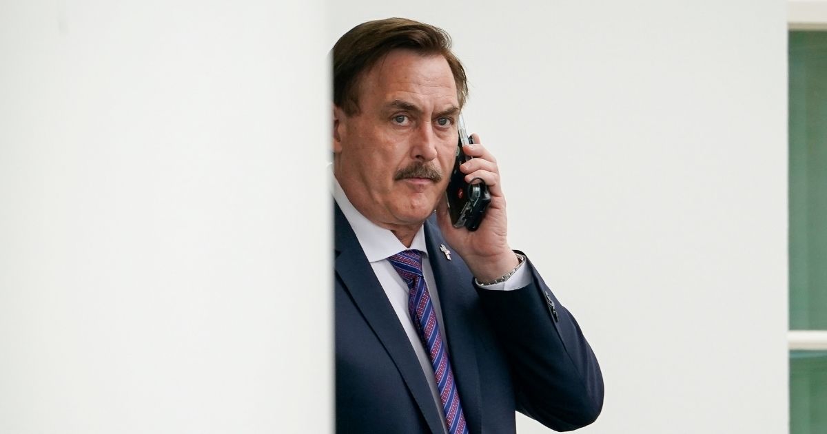 MyPillow CEO Mike Lindell waits outside the West Wing of the White House before entering on Jan. 15, 2021, in Washington, D.C.