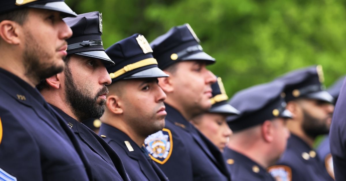 New York Police Department officers line up during a funeral service on May 4, 2021, in Greenlawn, New York.