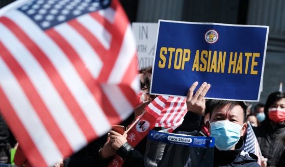 People participate in a protest against anti-Asian violence on April 4, 2021, in New York City.