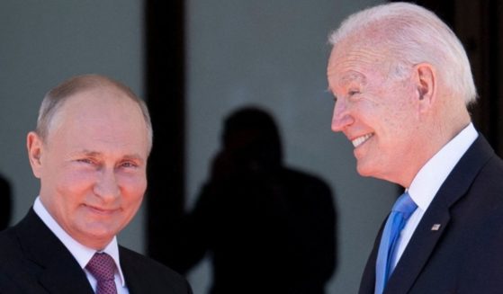 Russian President Vladimir Putin shakes hands with President Joe Biden prior to the U.S.-Russia summit at the Villa La Grange in Geneva on Wednesday.