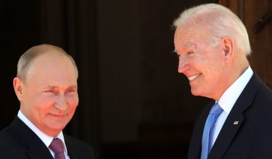 Russian President Vladimir Putin, left, greets a smiling President Joe Biden at the La Grange Villa in Geneva on Wednesday.