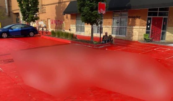 Red paint covers an area of Minneapolis on Thursday.
