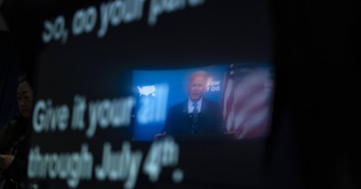 President Joe Biden speaking from a teleprompter