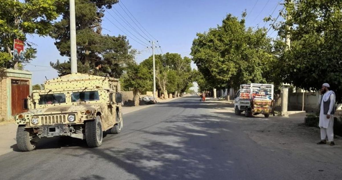 An Afghan army, Humvee, patrols in Kunduz city, north of Kabul, in Afghanistan on Monday.