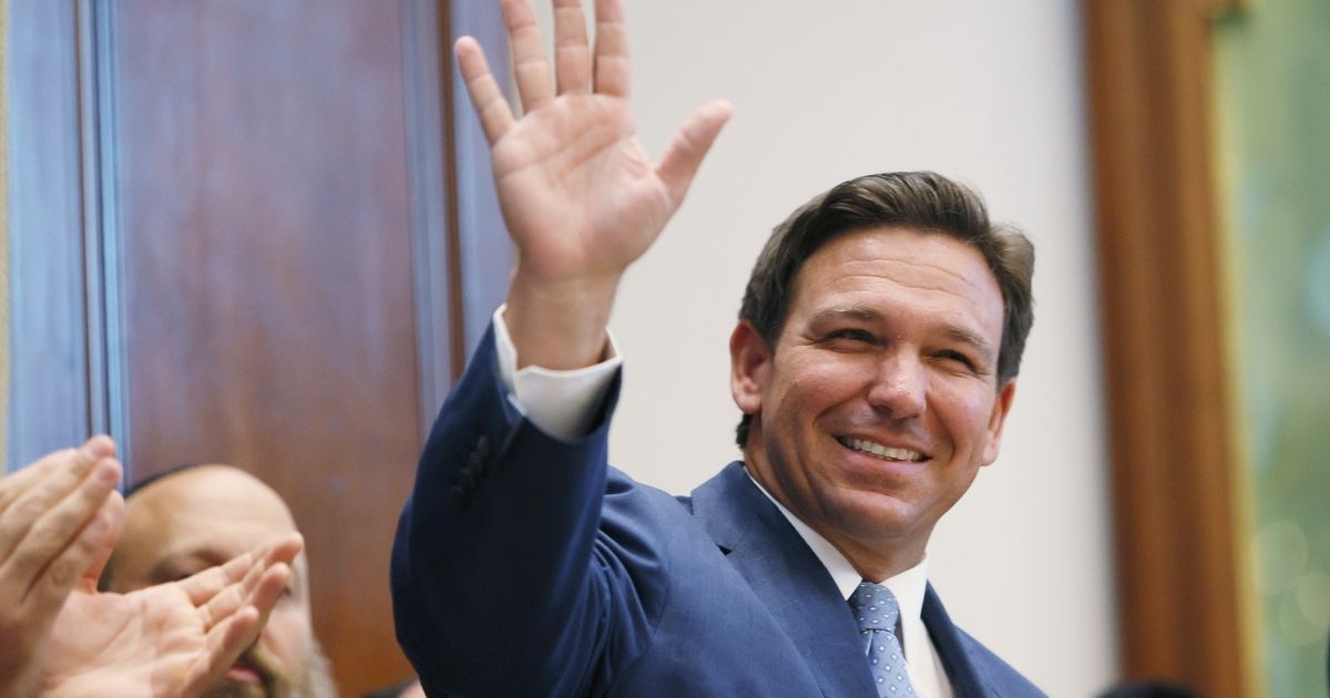 Republican Florida Gov. Ron DeSantis arrives to speak during a news conference at the Shul of Bal Harbour on Monday in Surfside, Florida.