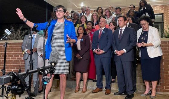 Democratic state Rep. Jessica Gonzales speaks during a news conference in Austin, Texas, early Monday after House Democrats staged a walkout to block an election integrity bill.