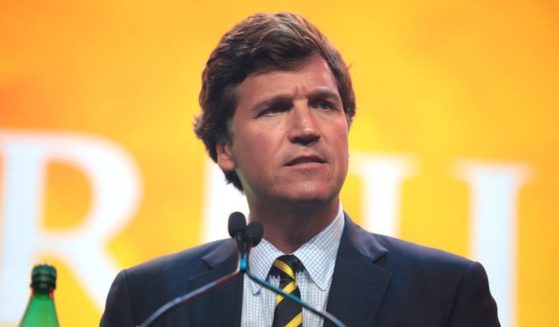 Tucker Carlson speaks with attendees at the 2020 Student Action Summit hosted by Turning Point USA at the Palm Beach County Convention Center in West Palm Beach, Florida.