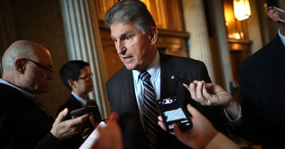 West Virginia Sen. Joe Manchin, pictured speaking with reporters at the Capitol on May 28.