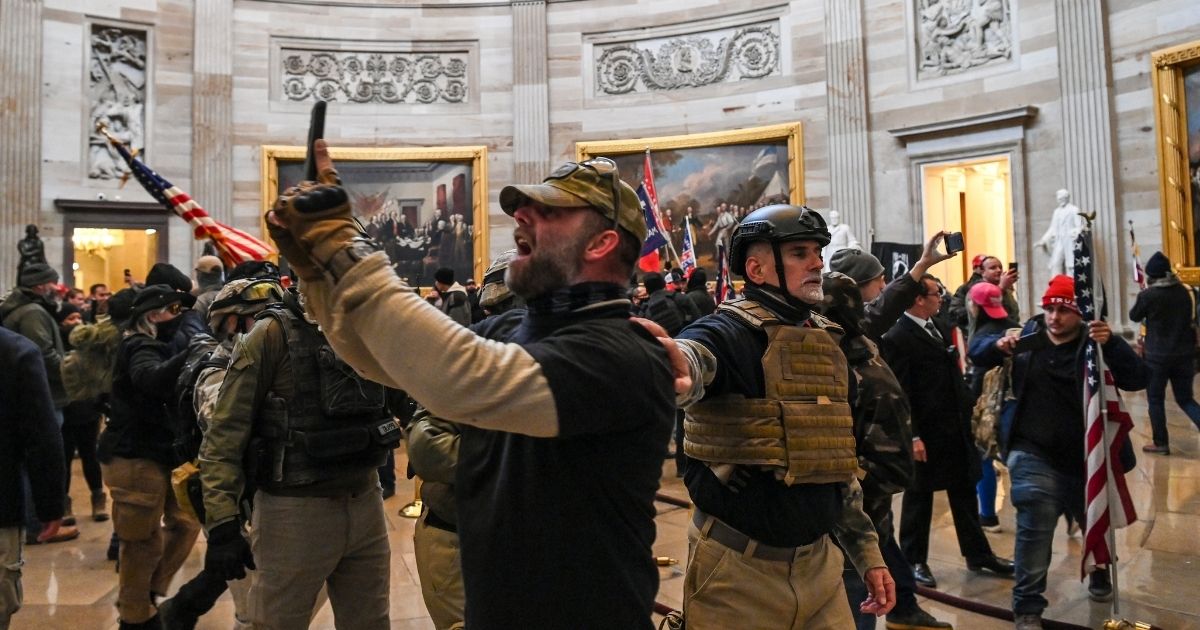 Supporters of then-President Donald Trump inside the Capitol Rotunda during the Jan. 6 incursion.