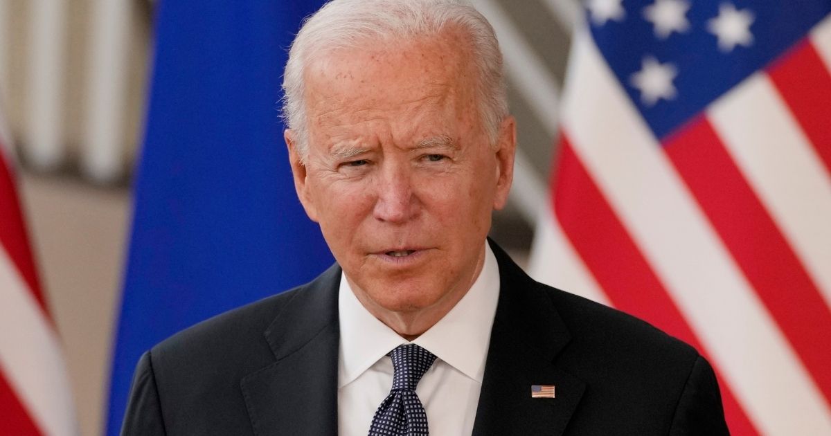 President Joe Biden addresses reporters Tuesday after arriving in Brussels for a summit with European Union leaders.