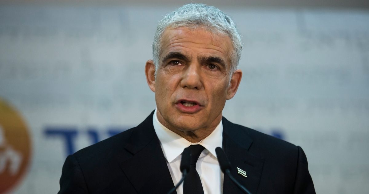 Yair Lapid, Israel's new foreign minister, talks to reporters during a May 6 news conference.