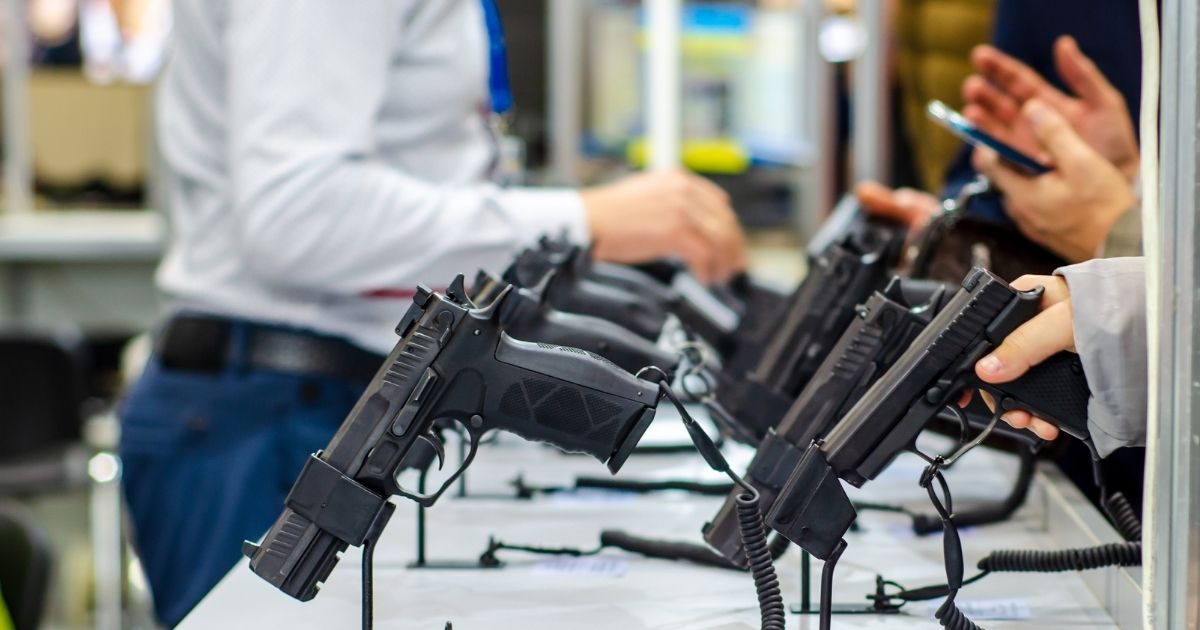 Handguns on display at a gun store.