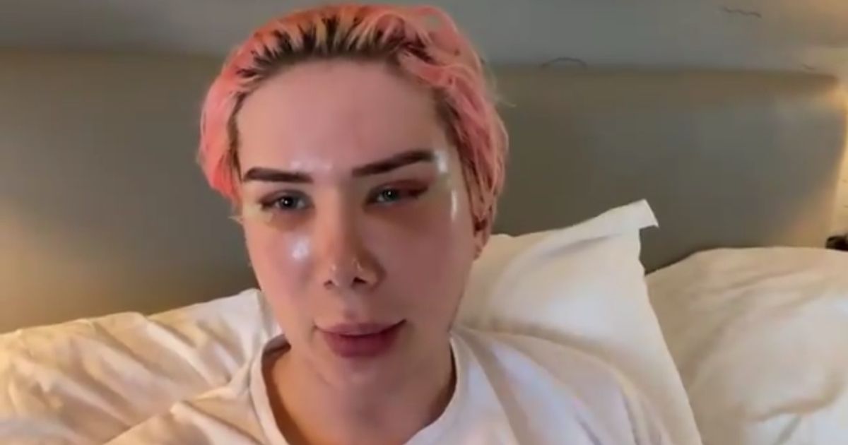 Instagram star Oli London, who identifies as "non-binary," has undergone 18 surgeries to become the world's first "transracial" person.