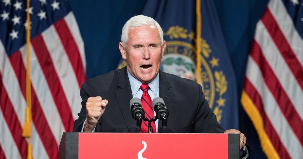 Former Vice President Mike Pence addresses the GOP Lincoln-Reagan Dinner on June 3 in Manchester, New Hampshire.