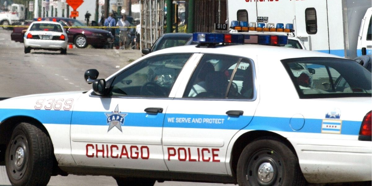 Chicago Police activity is seen near Windy City Core Supply Inc., an auto parts warehouse in which seven people, one of them being the gunman, were killed August 27, 2003 in Chicago.