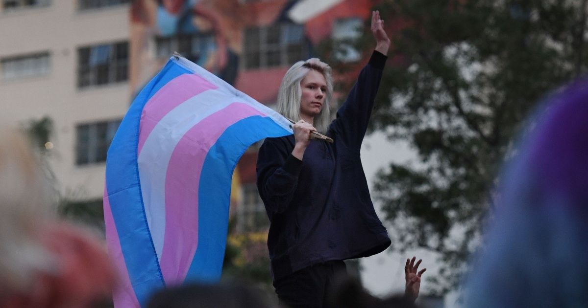 Pro-transgender activists hold a rally and march to city hall in Los Angeles on Nov. 2, 2018.