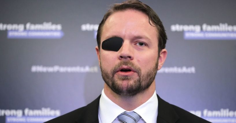 Texas Republican Rep. Dan Crenshaw joins fellow Republicans from the House and Senate to introduce paid family leave legislation during a news conference on Capitol Hill on March 27, 2019, in Washington, D.C.