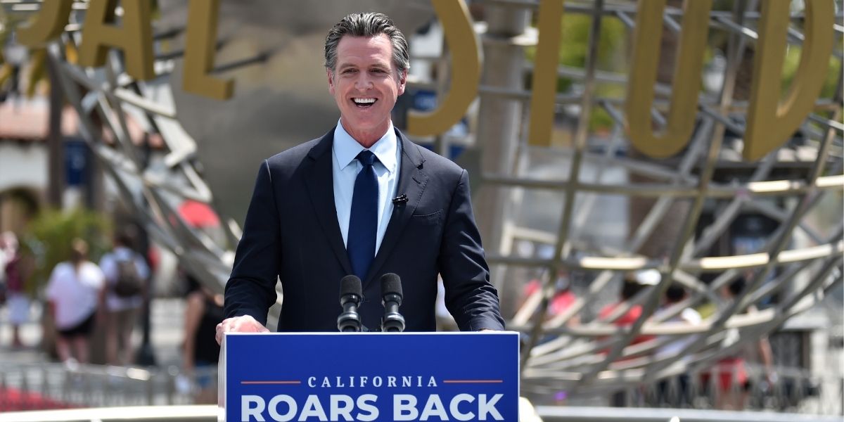 California Gov. Gavin Newsom attends a news conference for the official reopening of the state at Universal Studios Hollywood on June 15, 2021, in Universal City, California.