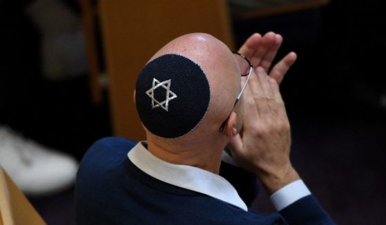 A supporter wears a yarmulke bearing the Star of David during a Peace and Solidarity with Israel rally at The Central Synagogue in Sydney on May 23, 2021.