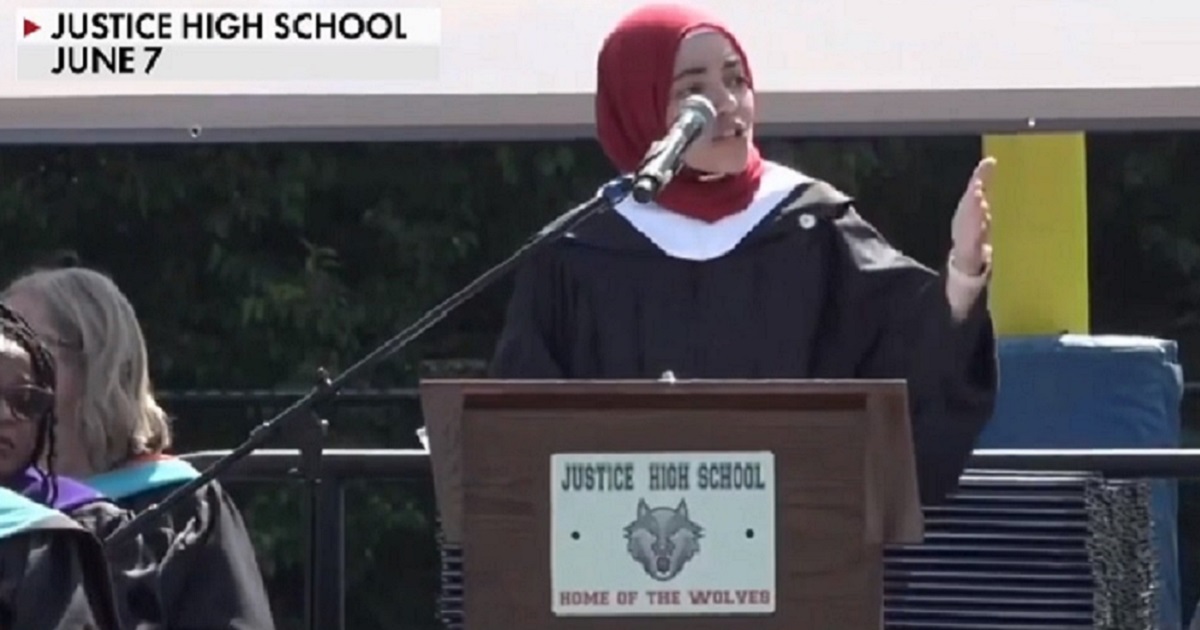 Fairfax County, Virginia, school board member Abrar Omeish delivers the commencement address June 7 at Justice High School in Fairfax, Virginia.