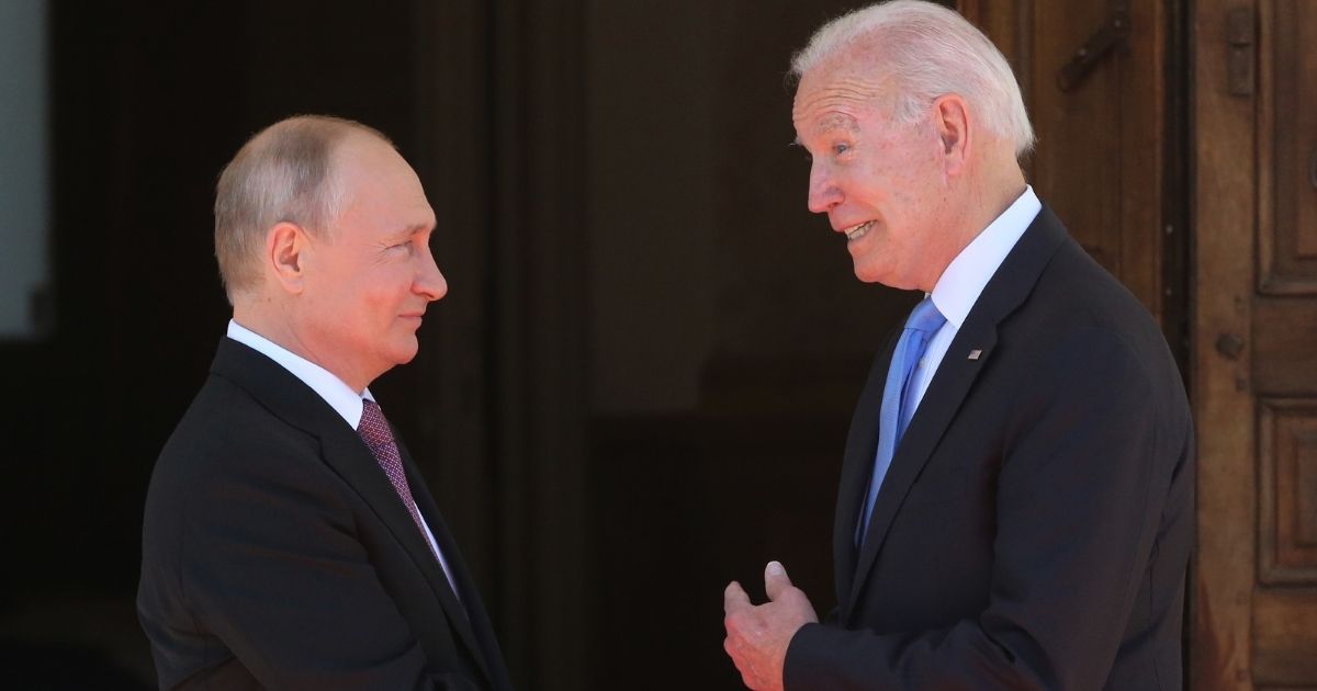 Russian President Vladimir Putin, left, greets U.S. President Joe Biden during the U.S.-Russia summit Wednesday in Geneva, Switzerland.