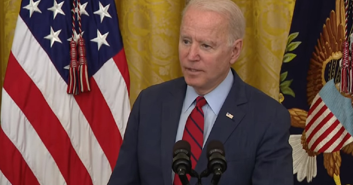 President Joe Biden answsers questions at the White House on Friday.