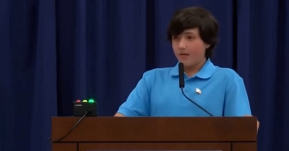 Minnesota teenager Brad Taylor speaks before his soon-to-be-former school board.