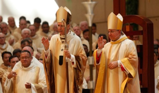 Cardinal Roger Mahony celebrates a mass with Archbishop Jose H. Gomez, right, at the Cathedral of Our Lady of the Angels on May 26, 2010, in downtown Los Angeles.