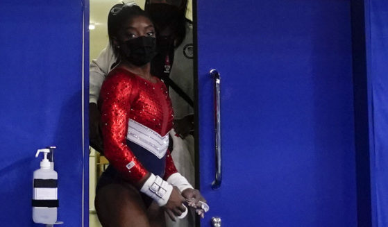 Simone Biles leaves a medical station during the artistic gymnastics women's final at the 2020 Summer Olympics in Tokyo on Tuesday.