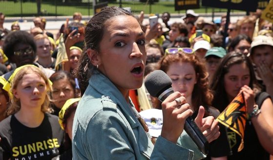 Democratic New York Rep. Alexandria Ocasio-Cortez rallies hundreds of young climate activists in Lafayette Square on the north side of the White House to demand that U.S. President Joe Biden work to make the Green New Deal into law on June 28 in Washington, D.C.