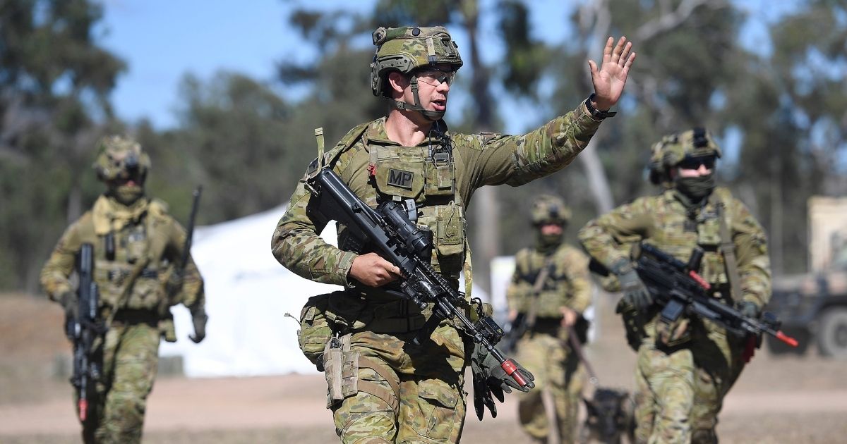 Members of the 1st Military Police Battalion participate in a stability action on Aug. 12, 2020, in Townsville, Australia.