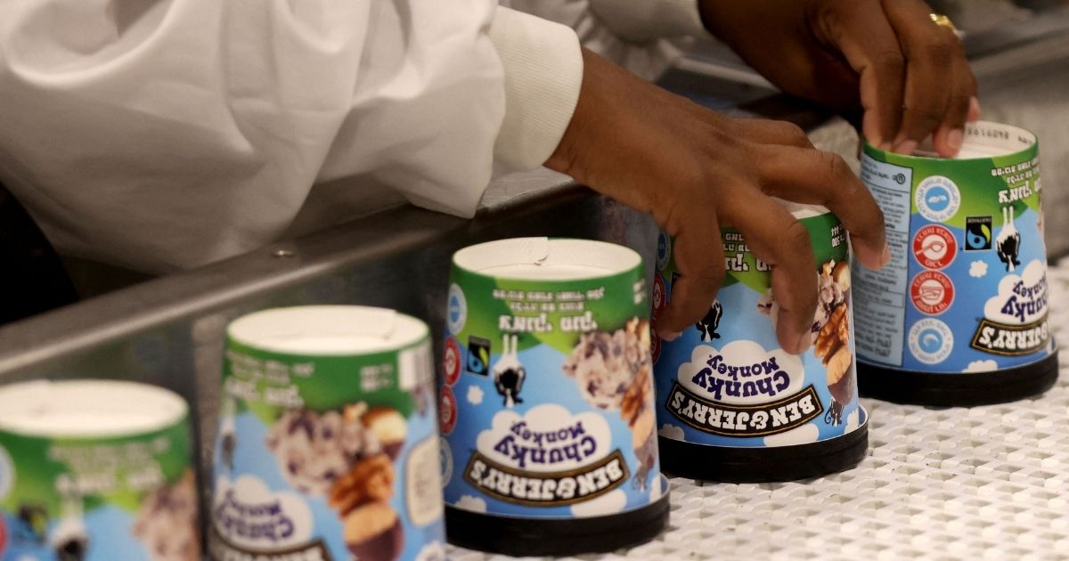 A laborer works on a production line filling ice cream pots at the Ben & Jerry's factory in Be'er Tuvia in southern Israel on Wednesday.