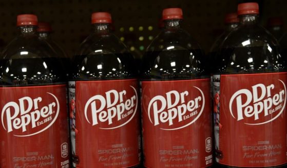 Dr. Pepper bottles are seen in the stock image above.