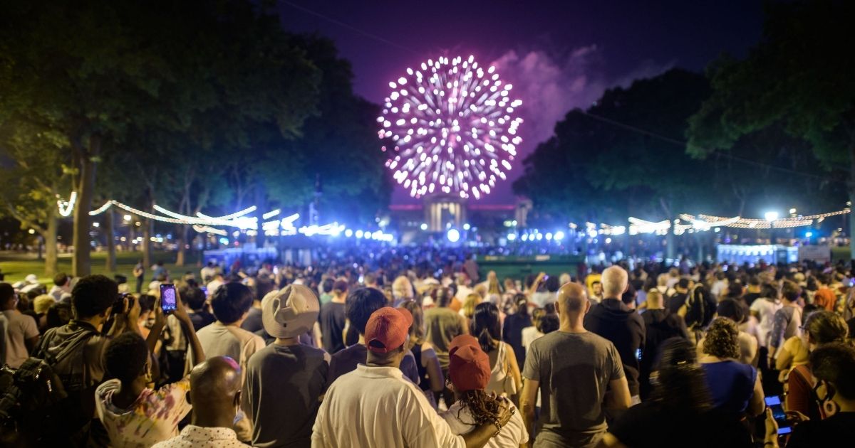 Spectators watch the annual Independence Day fireworks display outside the Philadelphia Museum of Art in Philadelphia on Sunday.