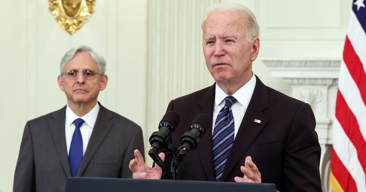 President Joe Biden, joined by Attorney General Merrick Garland, speaks about gun control measures at the White House in Washington on June 23.