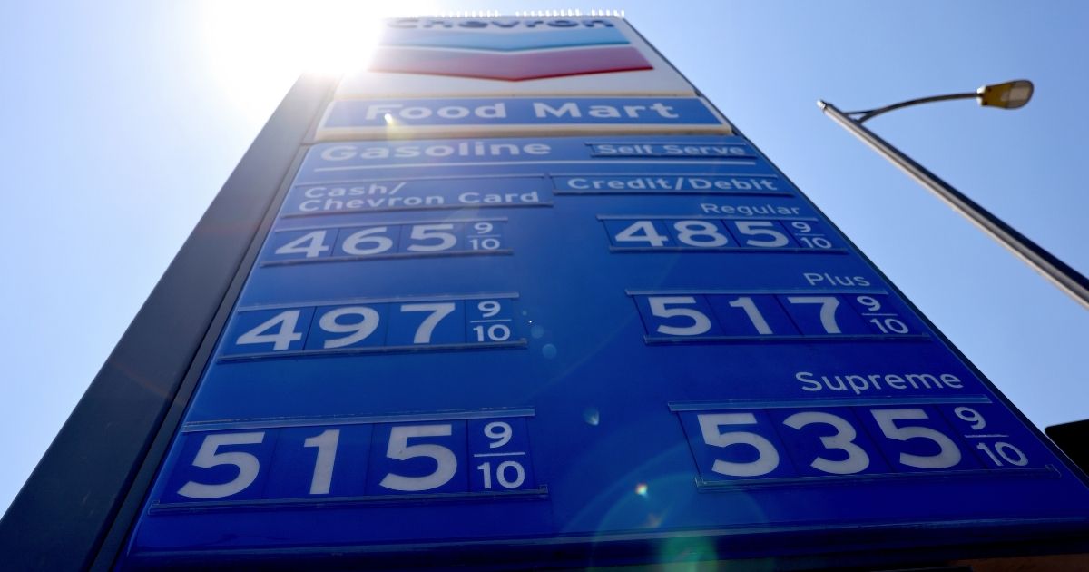 Gas prices are displayed at a Chevron station on June 14, 2021 in Los Angeles, California.