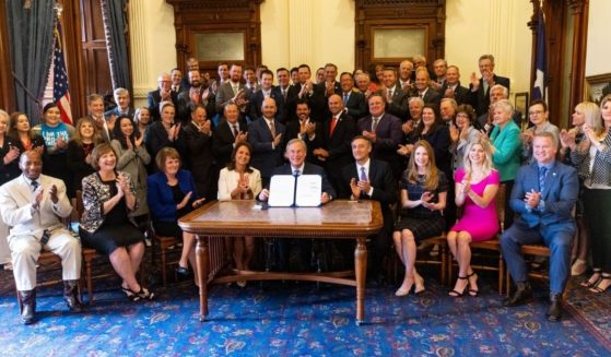 Texas Gov. Greg Abbott signed a bill on Tuesday that would outlaw abortion in the event that the Supreme Court overturns Roe v. Wade.