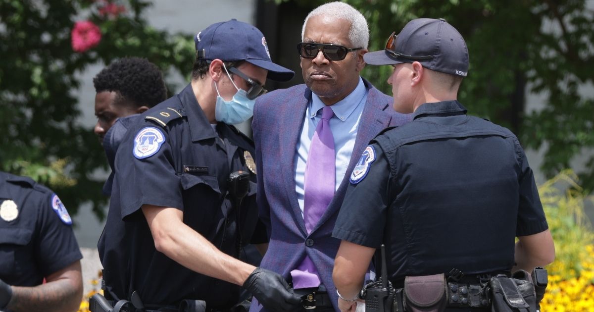 Democratic Rep. Hank Johnson of Georgia is arrested by U.S. Capitol Police during a protest outside Hart Senate Office Building on Capitol Hill in Washington on Thursday.