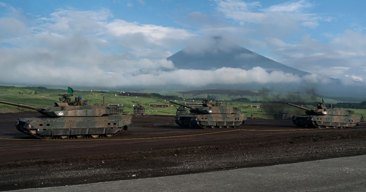 Japan Ground Self-Defense Force battle tanks move during a live fire exercise at the foot of Mount Fuji in the Hataoka district of the East Fuji Maneuver Area in Gotemba, Shizuoka, on Aug. 22, 2019.