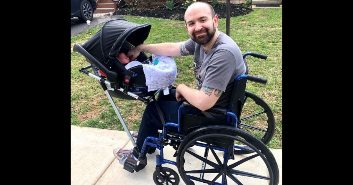 Jeremy King and his son, Phoenix, using the device that students at Bullis School designed and built for him as part of their "Making for Social Good" course.