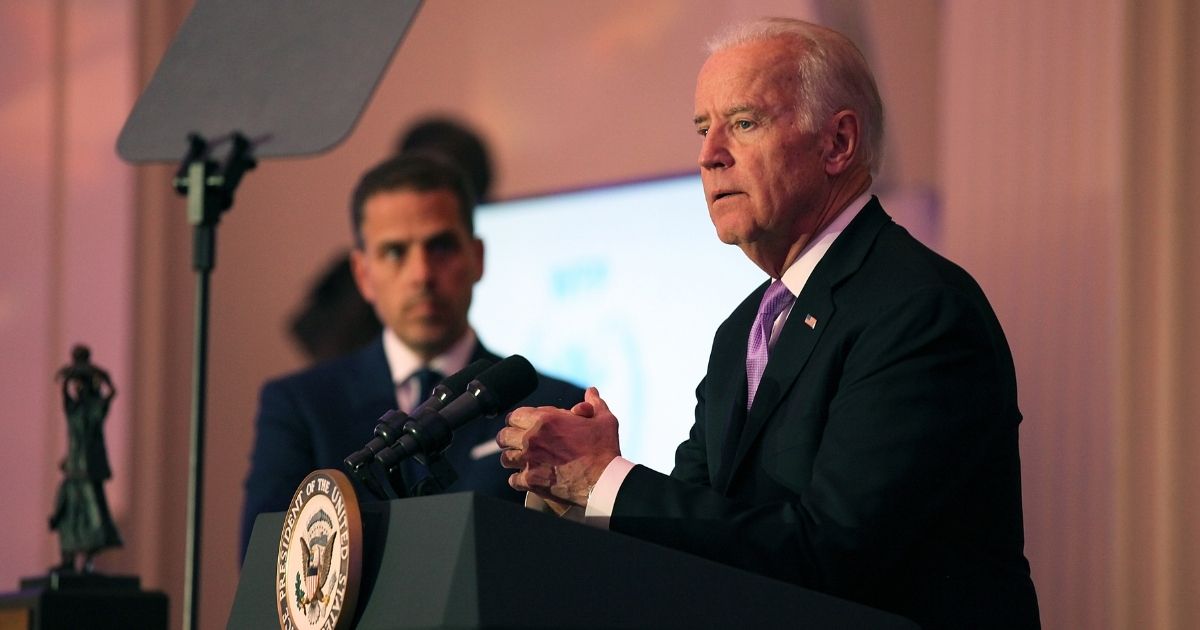 Hunter Biden, left, and then-Vice President Joe Biden speak on stage at the World Food Program USA's Annual McGovern-Dole Leadership Award Ceremony at Organization of American States on April 12, 2016, in Washington, D.C.