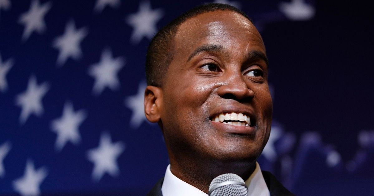 John James speaks at an election night event after winning the Michigan GOP Senate primary at his business, James Group International, in Detroit on Aug. 7, 2018.