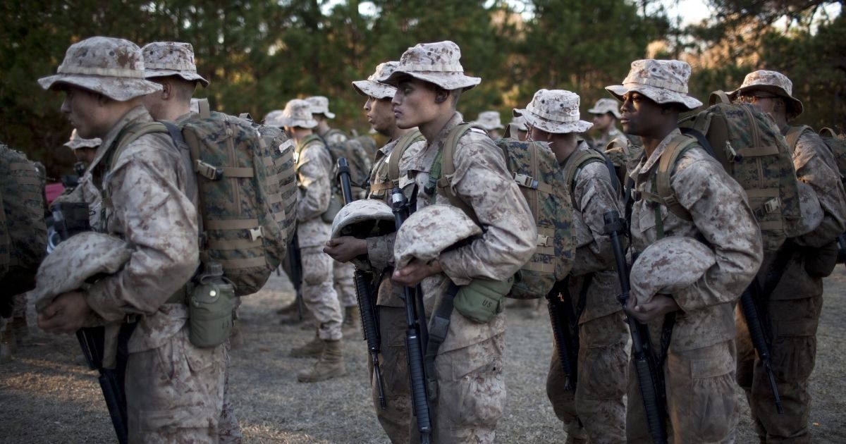 Marine Corps recruits line up in formation during the 54-hour Crucible exercise on Jan. 7, 2011, at the Marine Corps Recruit Depot on Parris Island, South Carolina.